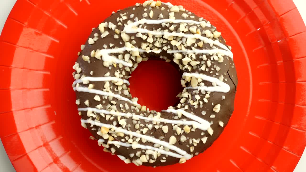 el donut está vidriado de cerca, con un bucle sin costuras.