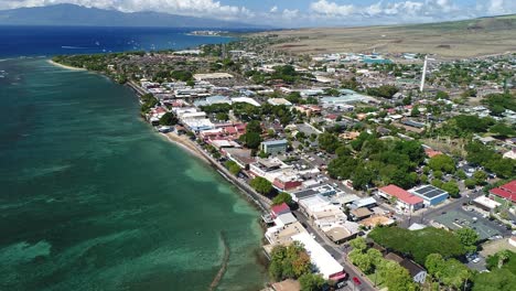 cinematic aerial drone shot of lahaina town, front street, maui, prior to 2023 fires