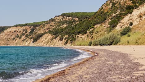 cinematic sea and ocean waves glide across the sand