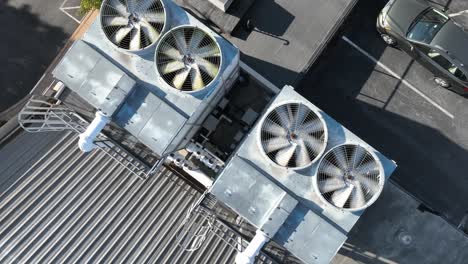 spinning shot of air conditioning utility unit on roof of industrial building