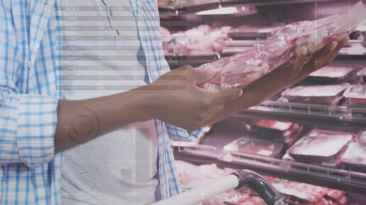Mature male shopper spotting vacuum-sealed meat in grocery section inspecting freshness, smiling