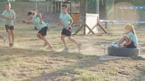 group of caucasian children training at boot camp