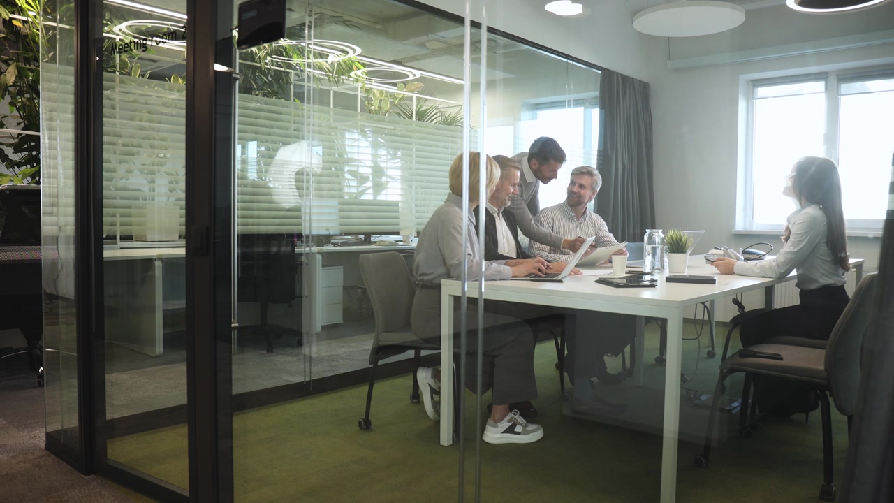 Business Team Having a Discussion in a Modern Office Meeting Room