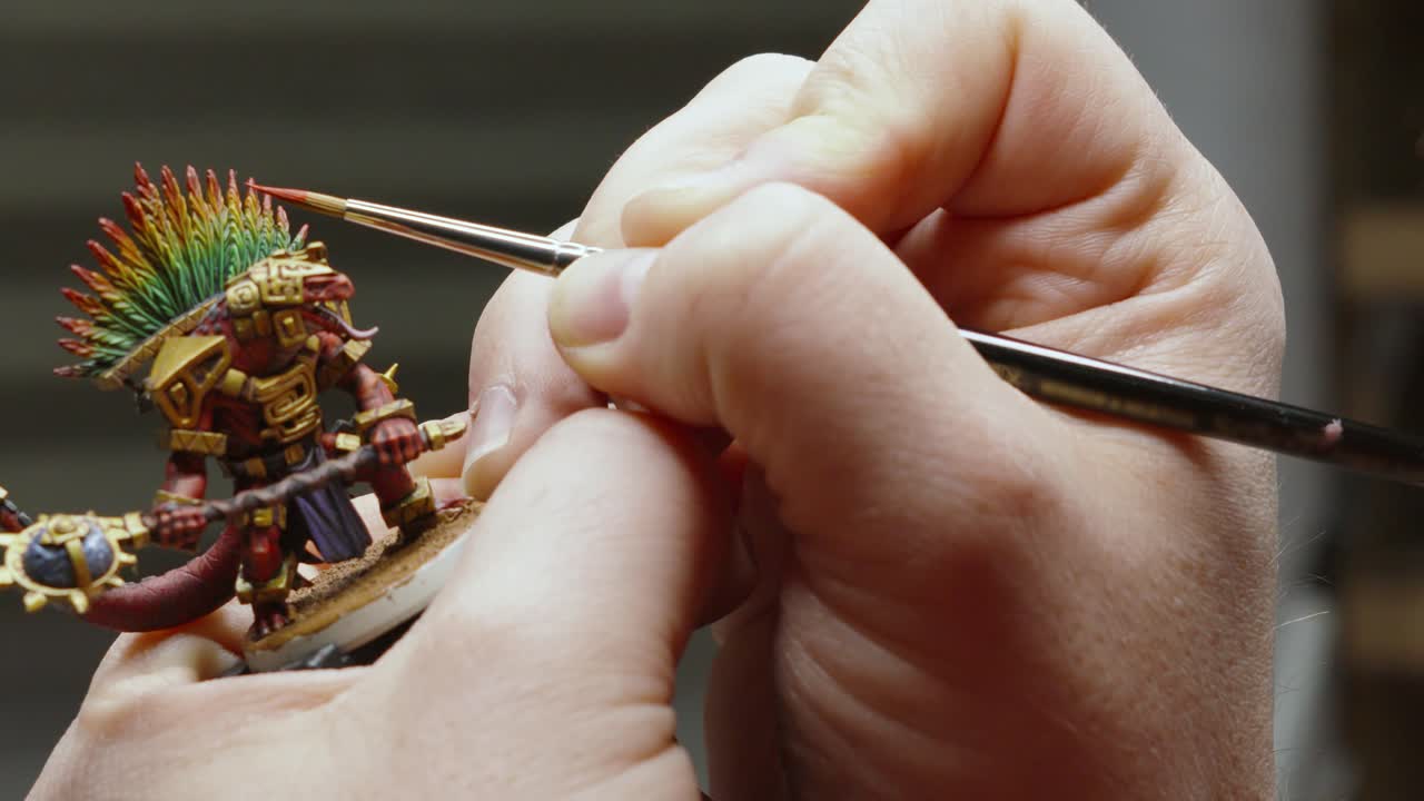 Artist Delicately Painting 3D Printed Fantasy Model with Great Detail and Care Gently Coloring Object with Different Shades to Bring Character to Life 4K