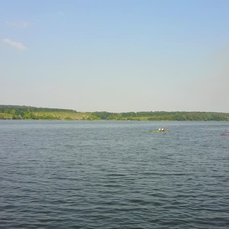 Kayakers Training On Canoe