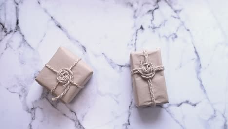 wrapped gifts on marble surface