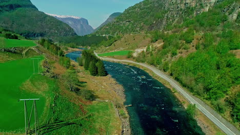 scenic aerial view of flam village norway picturesque valley and river drone video