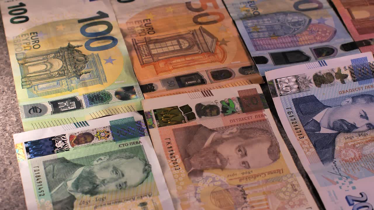 Bulgaria change currency, Bulgaria Lev to Euro. Money exchange. Paper banknotes on table. Concept, economy, competition, crisis, banking and finance. BGN,BGL. Scene B. Close up slide shot