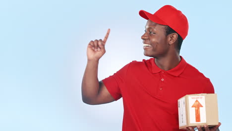 Happy-black-man,-box-and-pointing-for-delivery