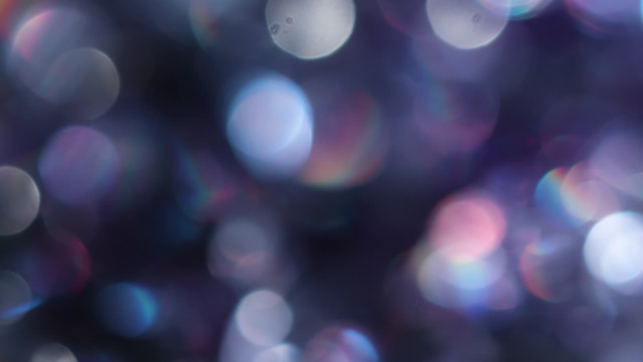 la rotación de los círculos bokeh en el sentido de las agujas del reloj