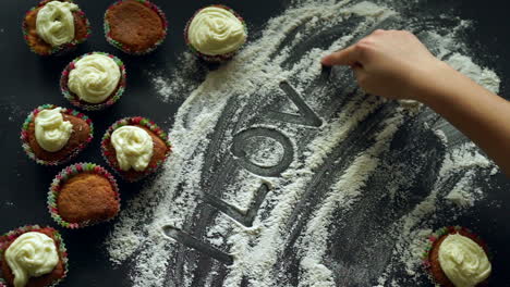 sweet love concept. inscription i love you on white flour kitchen background