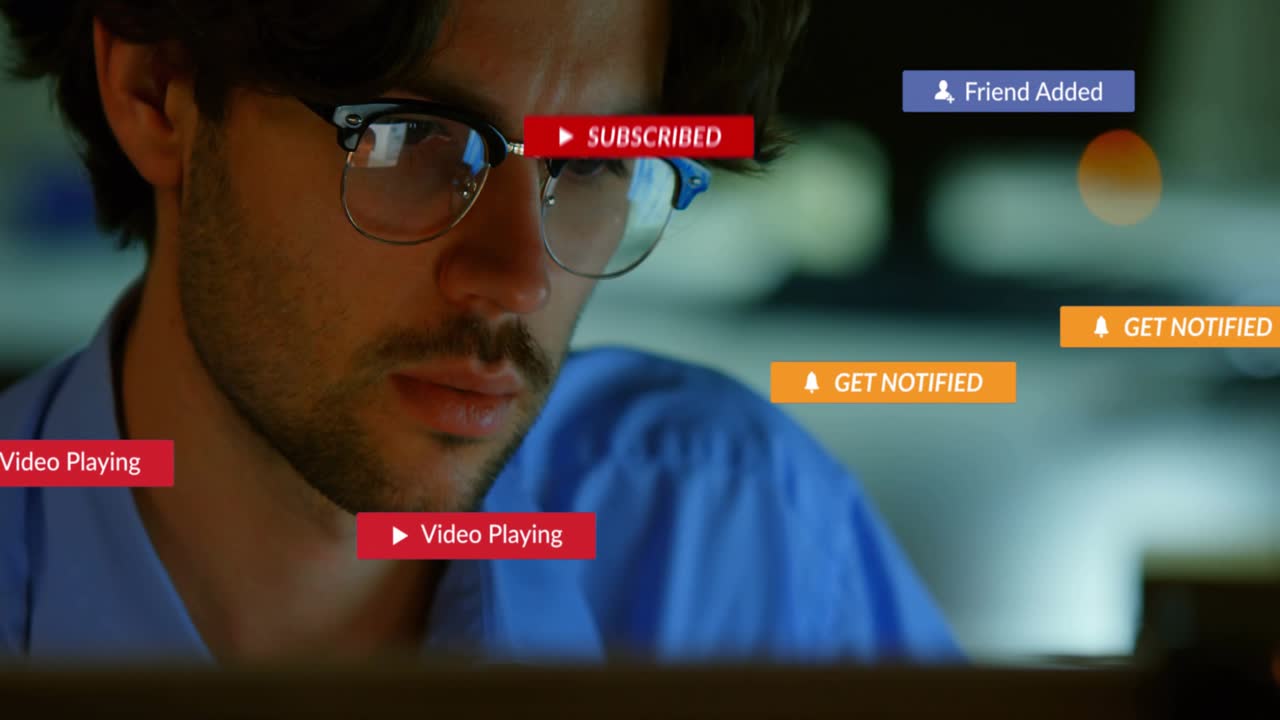 Man reviewing paper at desk, causing floating subscribe play icons with social media notifications