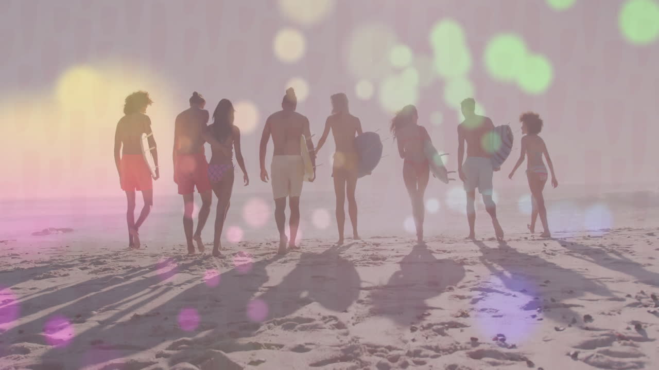 eight adults carrying surfboards walking along beach, sun casting shadows, bokeh flares for travel