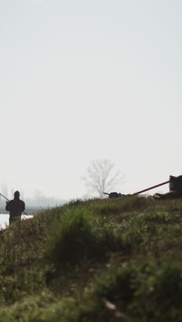 fisherman on the riverbank