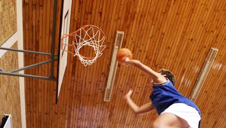 high school kids playing basketball