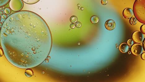 abstract colorful food oil drops bubbles and spheres flowing