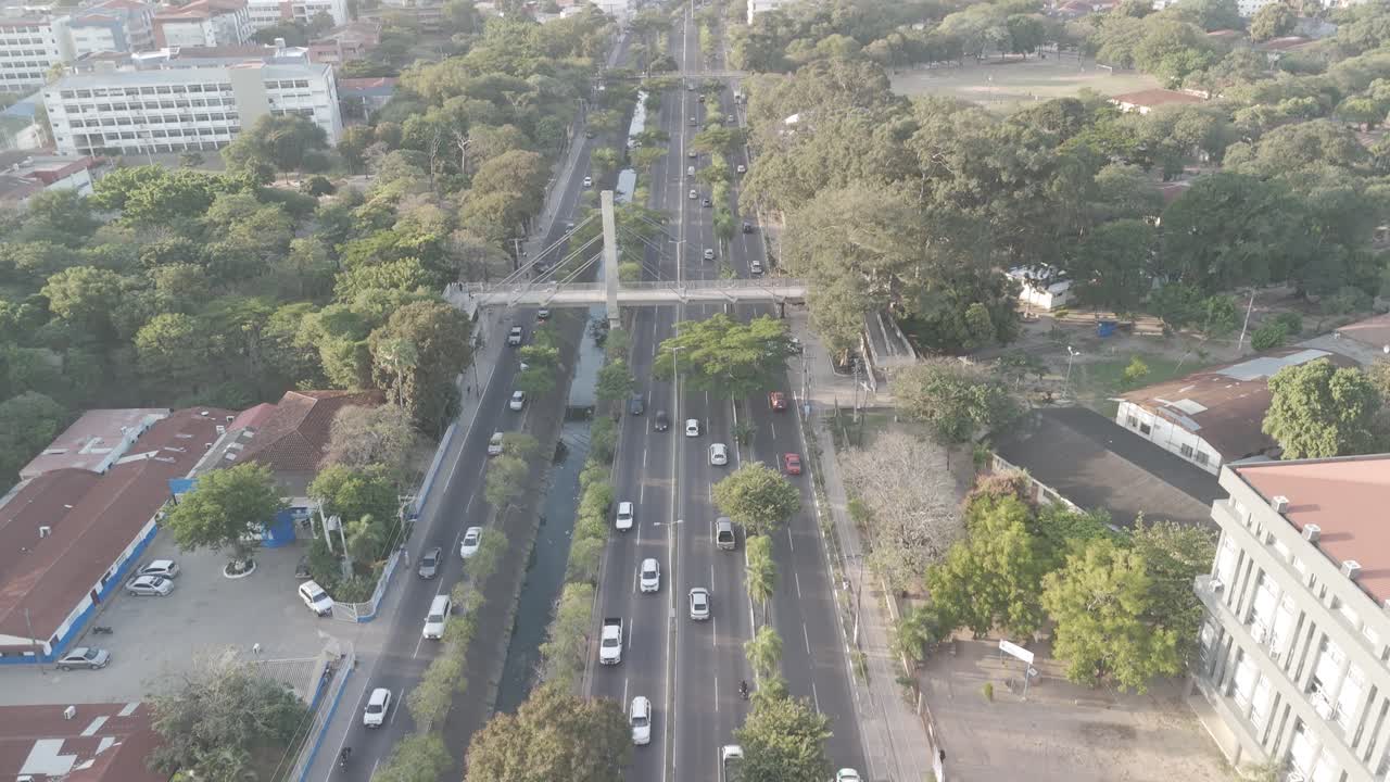 Aerial view of a busy city road with traffic