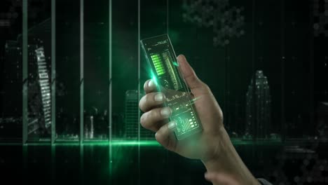 hand holding futuristic mobile phone against digitally generated background