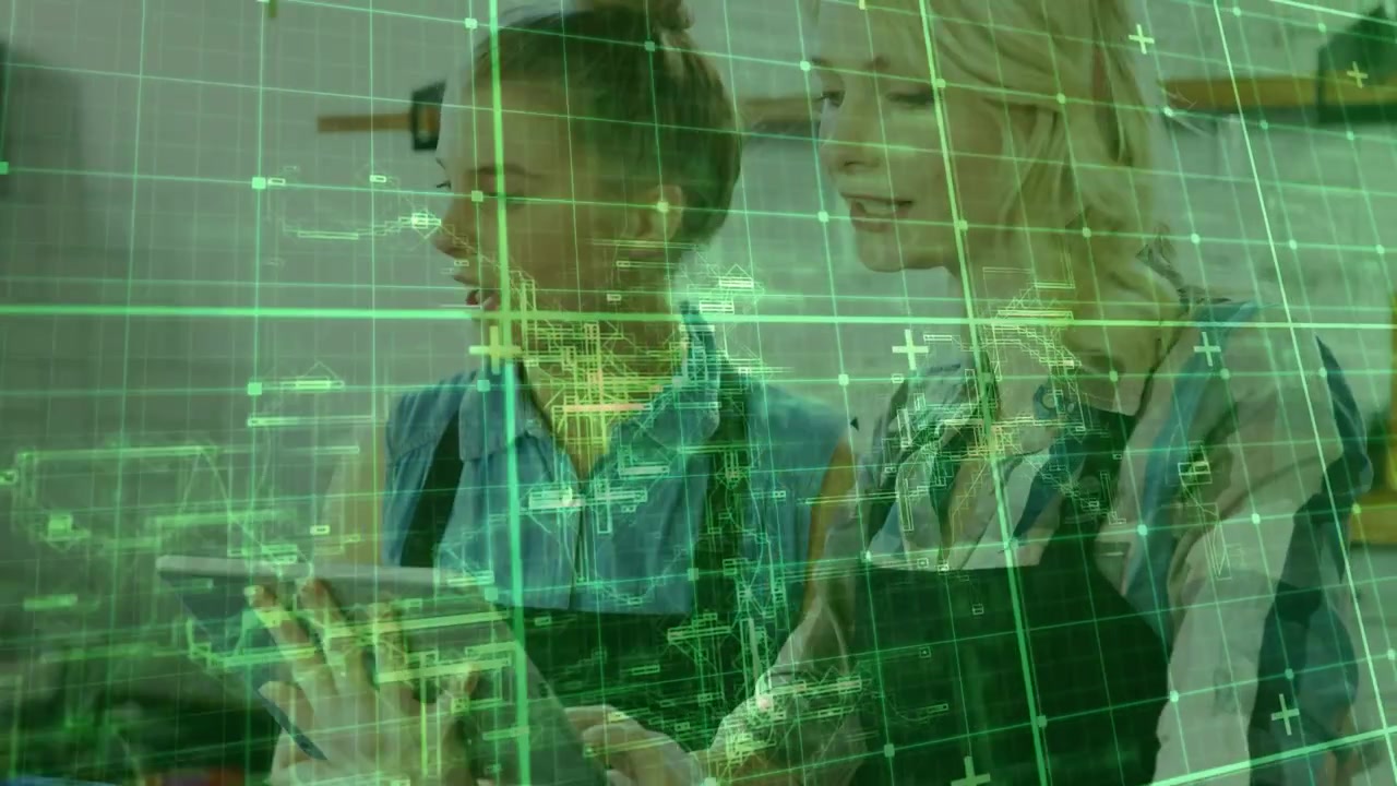Two female bakers consulting tablet, pointing at pastries while green grid overlay guiding process