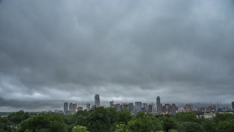 time lapse of large storm clouds and raining moving over austin texas