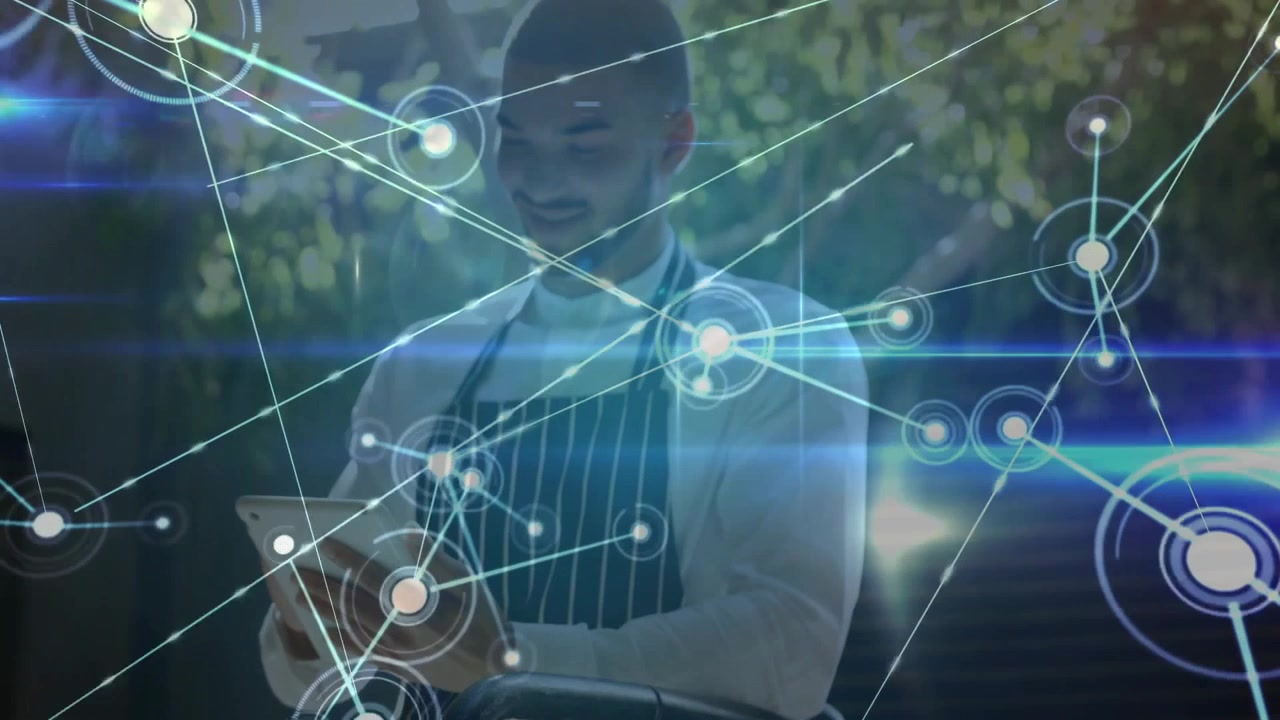 Male chef swiping tablet in patio and creating growing cooking technology network overlay on chest