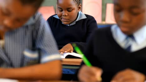 schoolkids studying in the classroom 4k