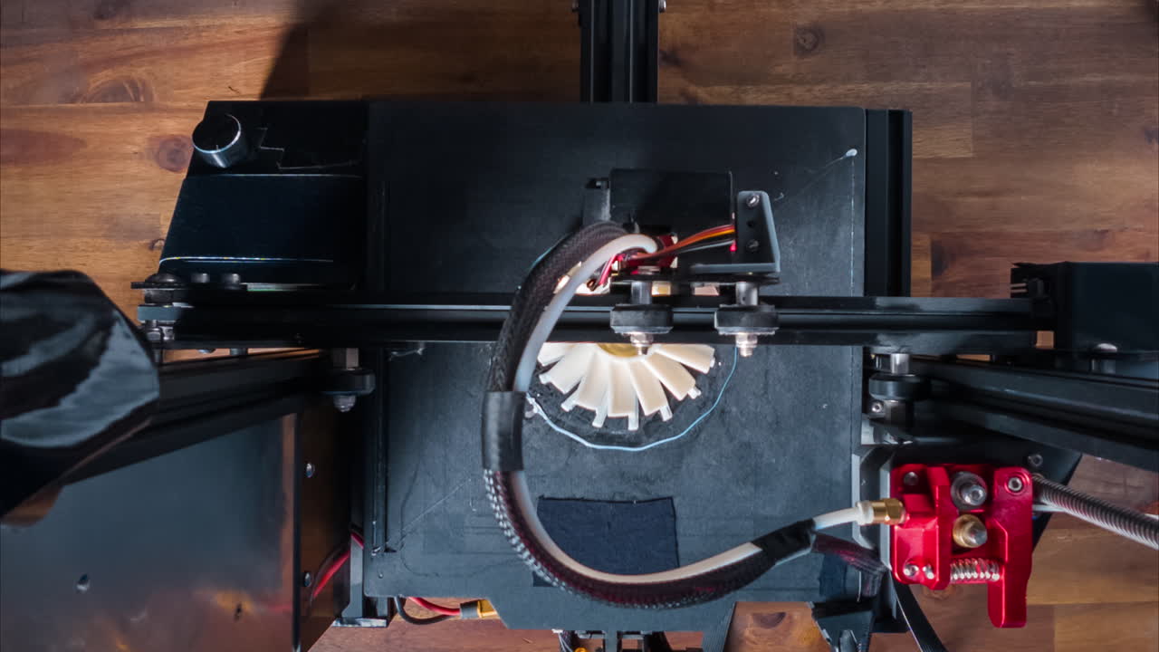 Timelapse of modern 3d printer works on a plastic prototype in a clean workspace focusing on the