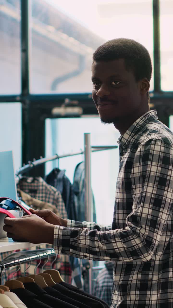 A man in a clothing store