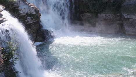 Base-of-turbulent-Lundbreck-Waterfall-produces-mist-and-whitewater