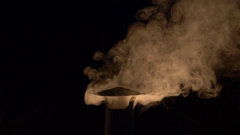 Billowing-Smoke-On-A-Pipe-Chimney-From-The-House-During-Cold-Winter-Night-In-Arendel,-Zagorow-Poland