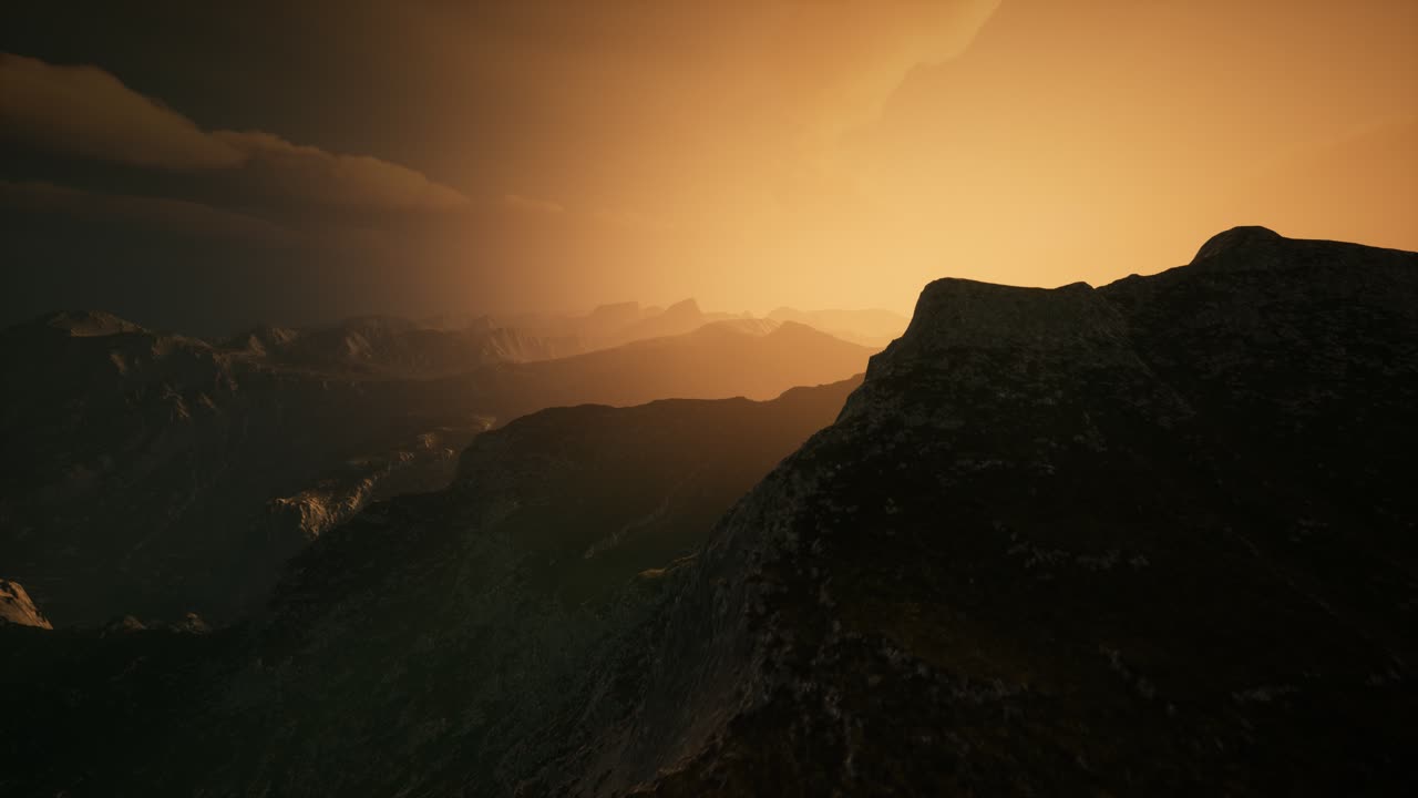 High mountain peaks covered with dramatic heavy fog