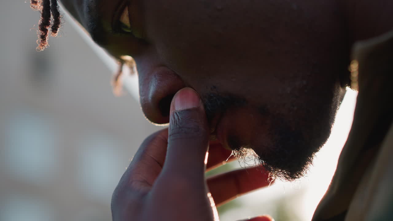 Urban Soldier Adjusting Helmet Early, Night Soldier Focusing On Helmet In Urban Rooftop At Dawn, Close Up Of Military Personnel Preparing Helmet During Sunrise With Lens Flare And City Background