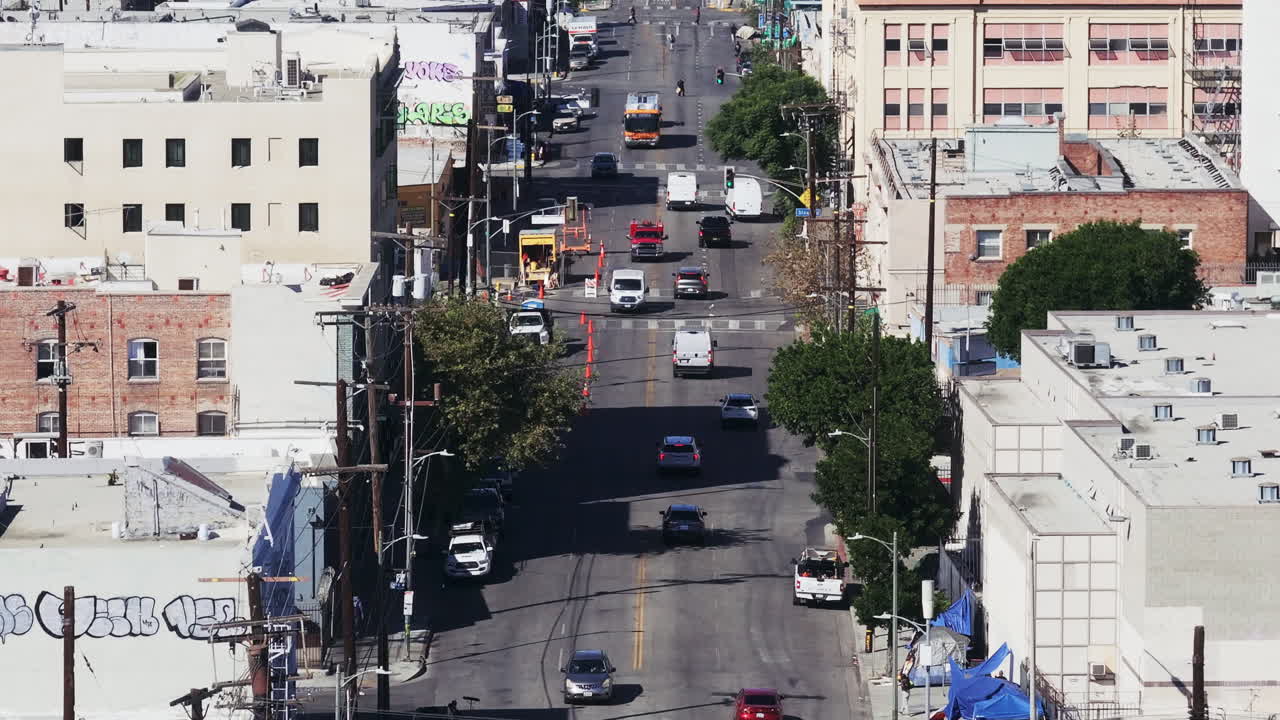 Aerial View of an Urban Street with Traffic and Buildings