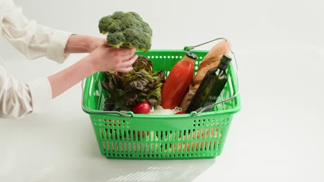 woman shopping with grocery basket