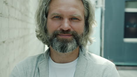 portrait of a man in an alley
