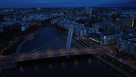 Flyover-Crusell-Bridge-on-Baltic-canal-on-blue-hour-Helsinki-evening