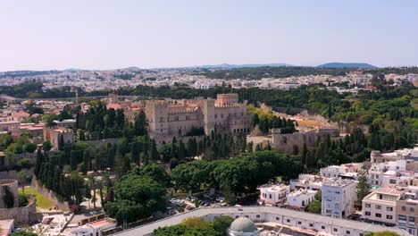 panoramic view of rhodes old town on rhodes island, greece. rhodes old fortress cityscape with sea port at foreground. travel destinations in rhodes, greece.