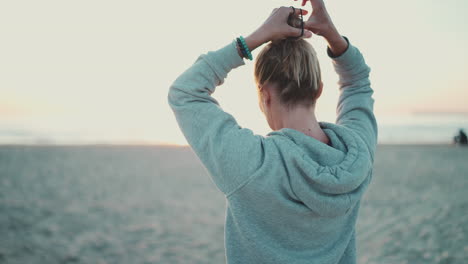 caucasian blonde girl preparing doing yoga.