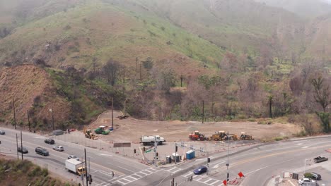 aerial close-up panning shot of the former site of the malibu feed farm that was burned in the palisades fire in malibu, california. 4k