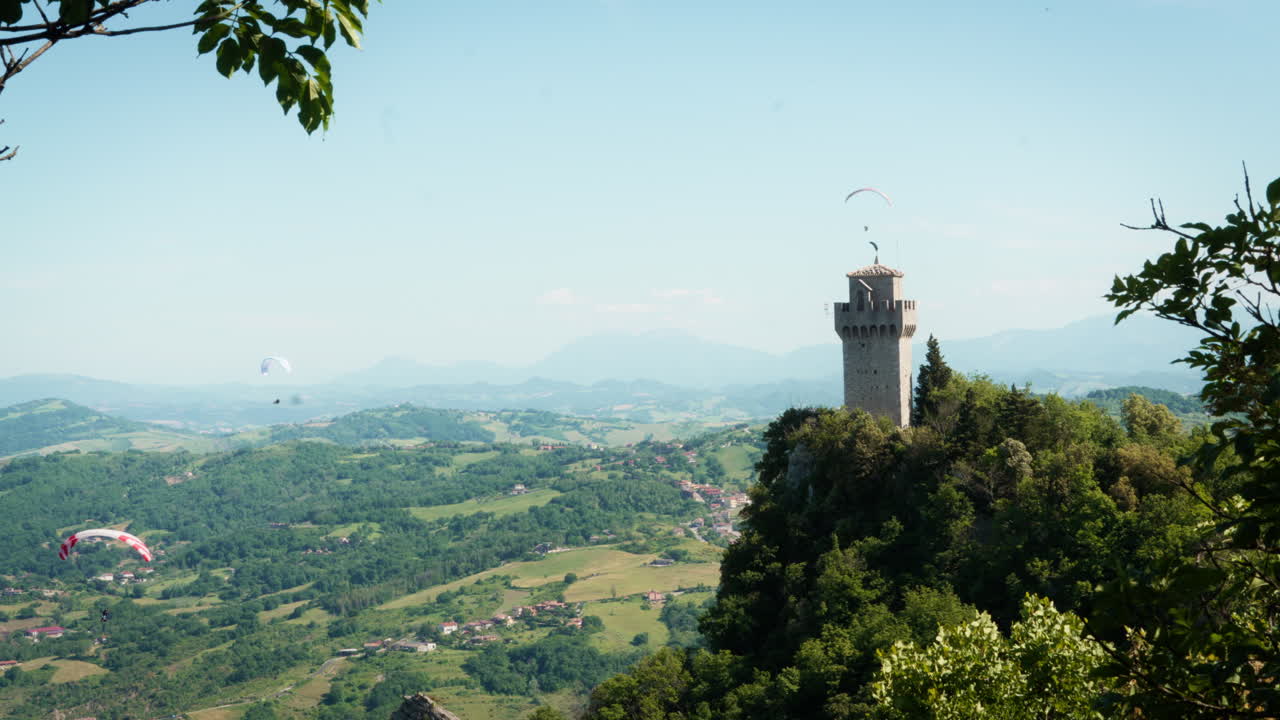 Picturesque landscape with a tower
