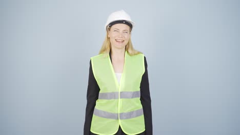 The-engineer-wearing-a-hard-hat-and-smiling.