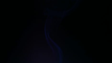 colors smoke in dark background