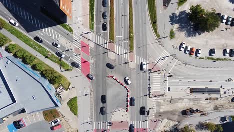 Busy-street-under-construction-in-Tallinn-downtown,-aerial-top-down-view