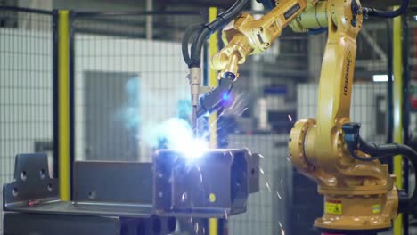 automated welding robot in action: high precision welding of structural steel components in a modern industrial environment