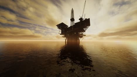 offshore jack up rig in the middle of the sea at sunset time