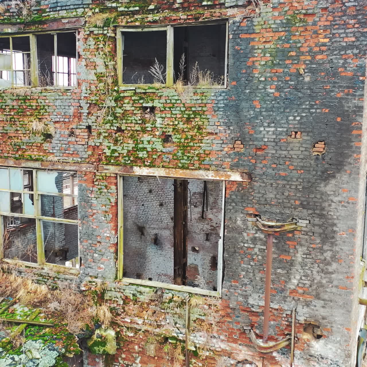 Abandoned industrial building. Ruins of an old factory. Aerial view