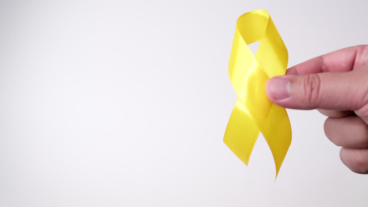 Giornata della prevenzione del suicidio, Mese della consapevolezza per l'infanzia, il sarcoma, il cancro alle ossa e alla vescica e Nastro Giallo a sostegno della vita e della malattia delle persone