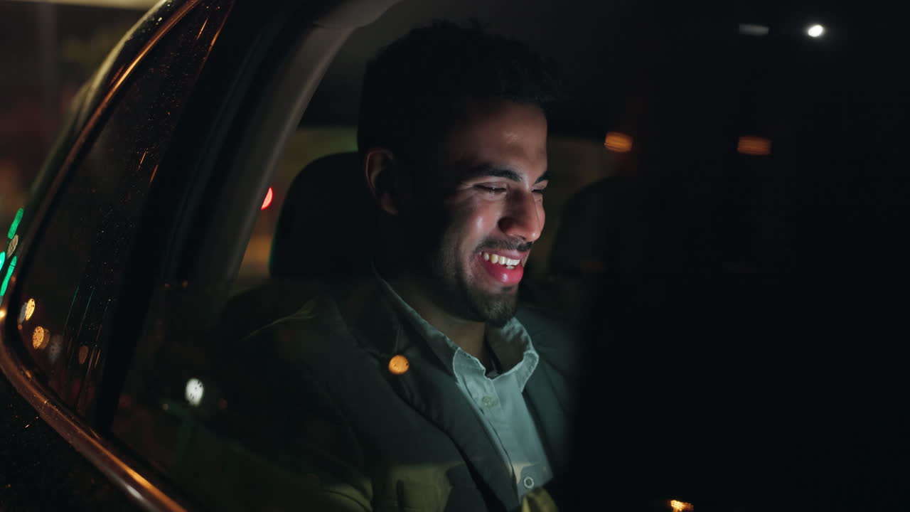 Man in a car at night