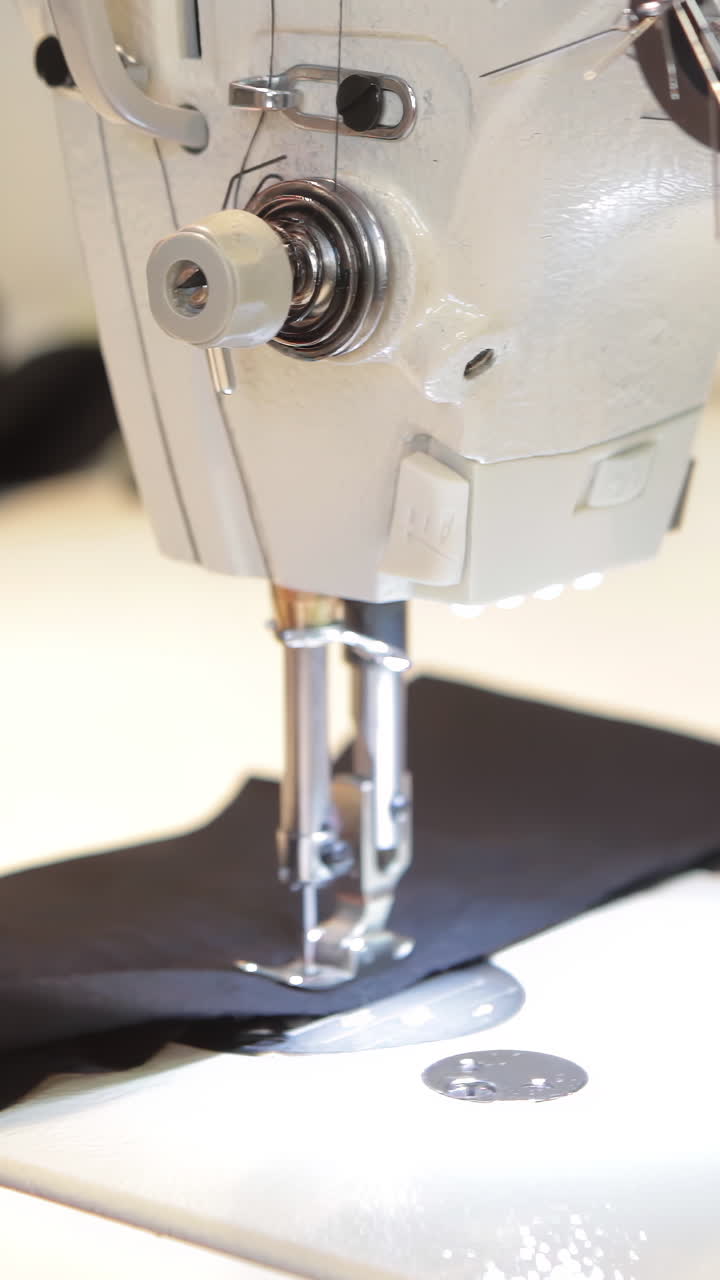 Close-up of a sewing machine in action | Premium Stock Video Footage
