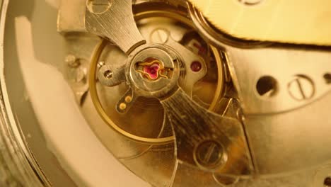 close up of watch mechanism working